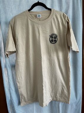 Vintage Beige Graphic T-Shirt with Small Chest Logo